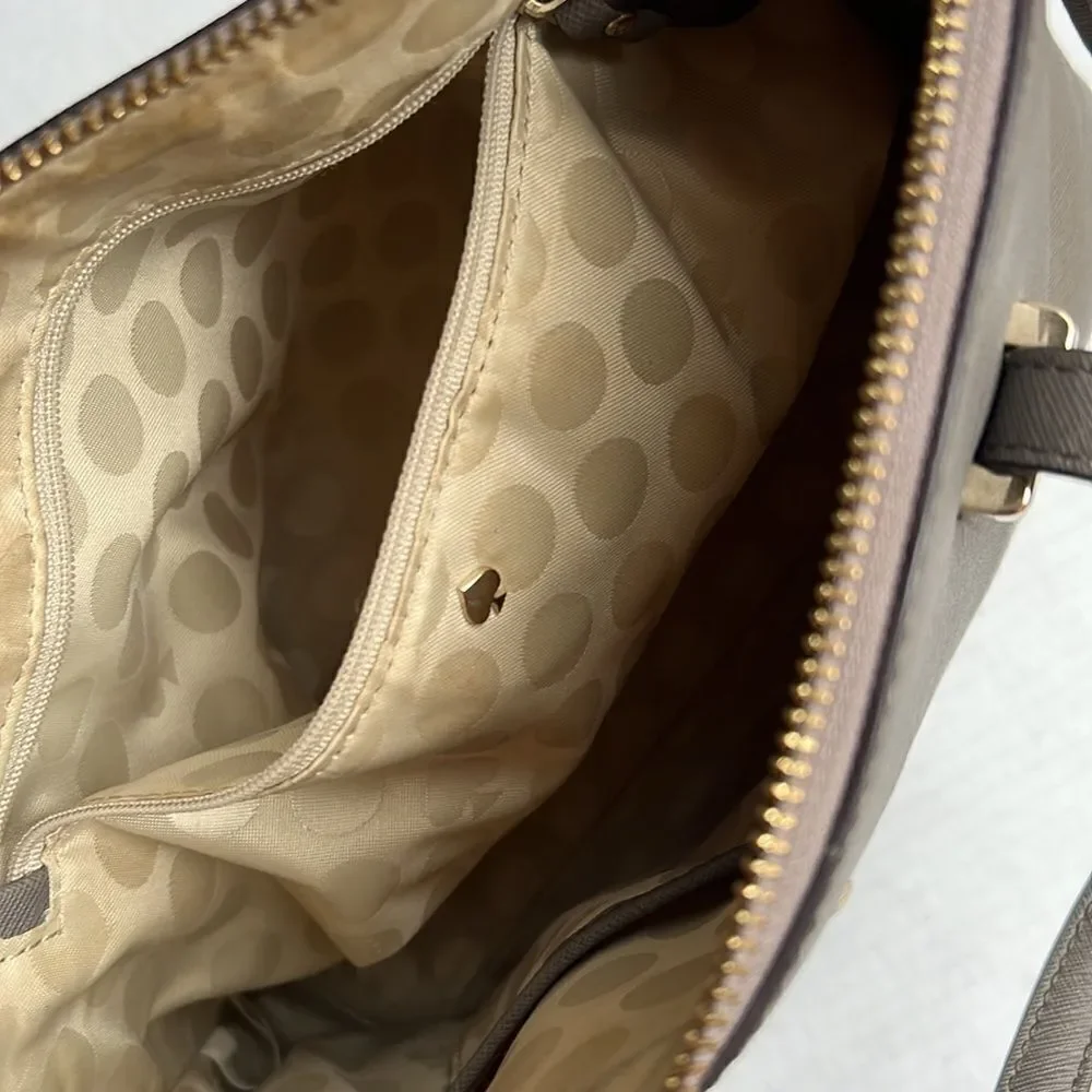 Kate Spade Cedar Street Maise Satchel in a shade of grey or taupe.